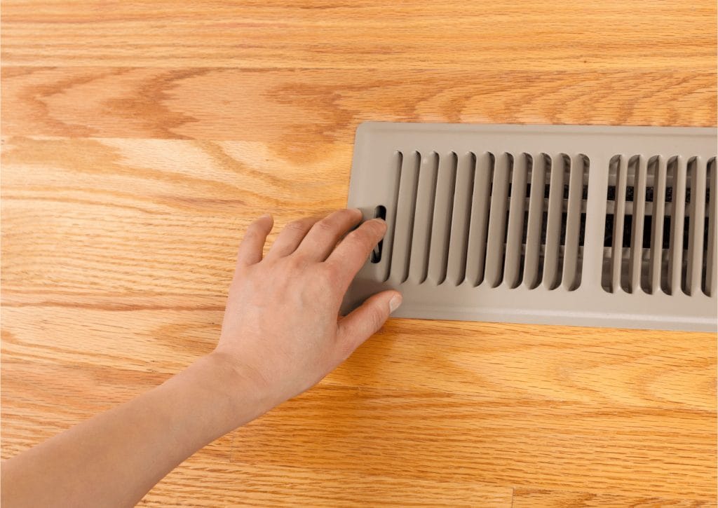 Flush-mount floor vent integrated into new flooring by The Floor 4U in Frankfort, IL. Seamless, custom vent solution for a high-end finish.