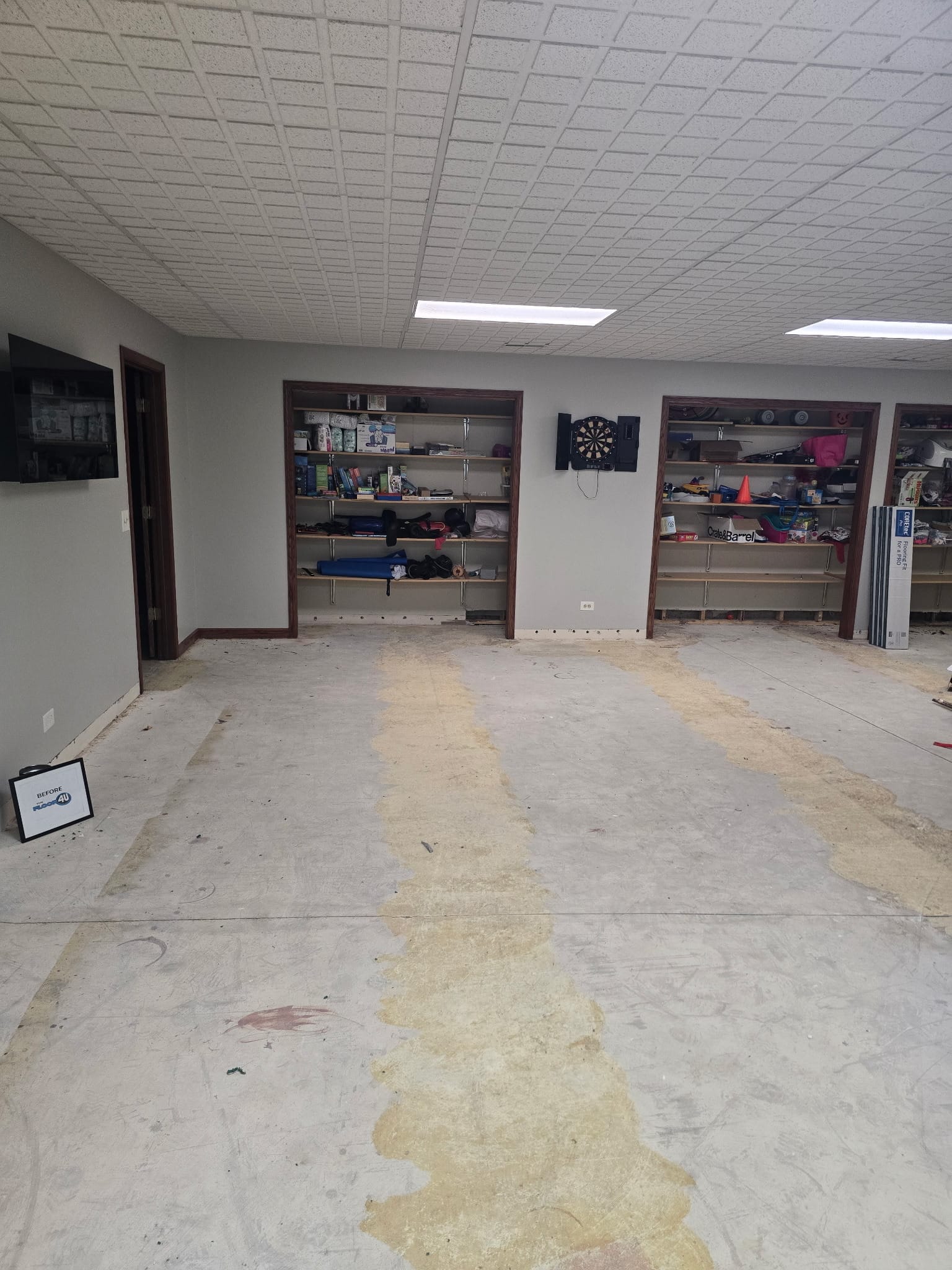 Basement subfloor before COREtec flooring installation in Downers Grove IL after carpet removal.