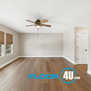 Hardwood flooring installed in an empty Mokena room by The Floor 4 U. Clean lines, modern finish, and expert craftsmanship.