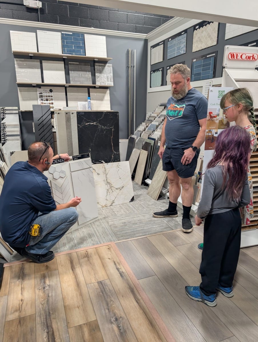 Matt Pehr, owner of The Floor 4U in Mokena IL, advising clients on luxury vinyl flooring