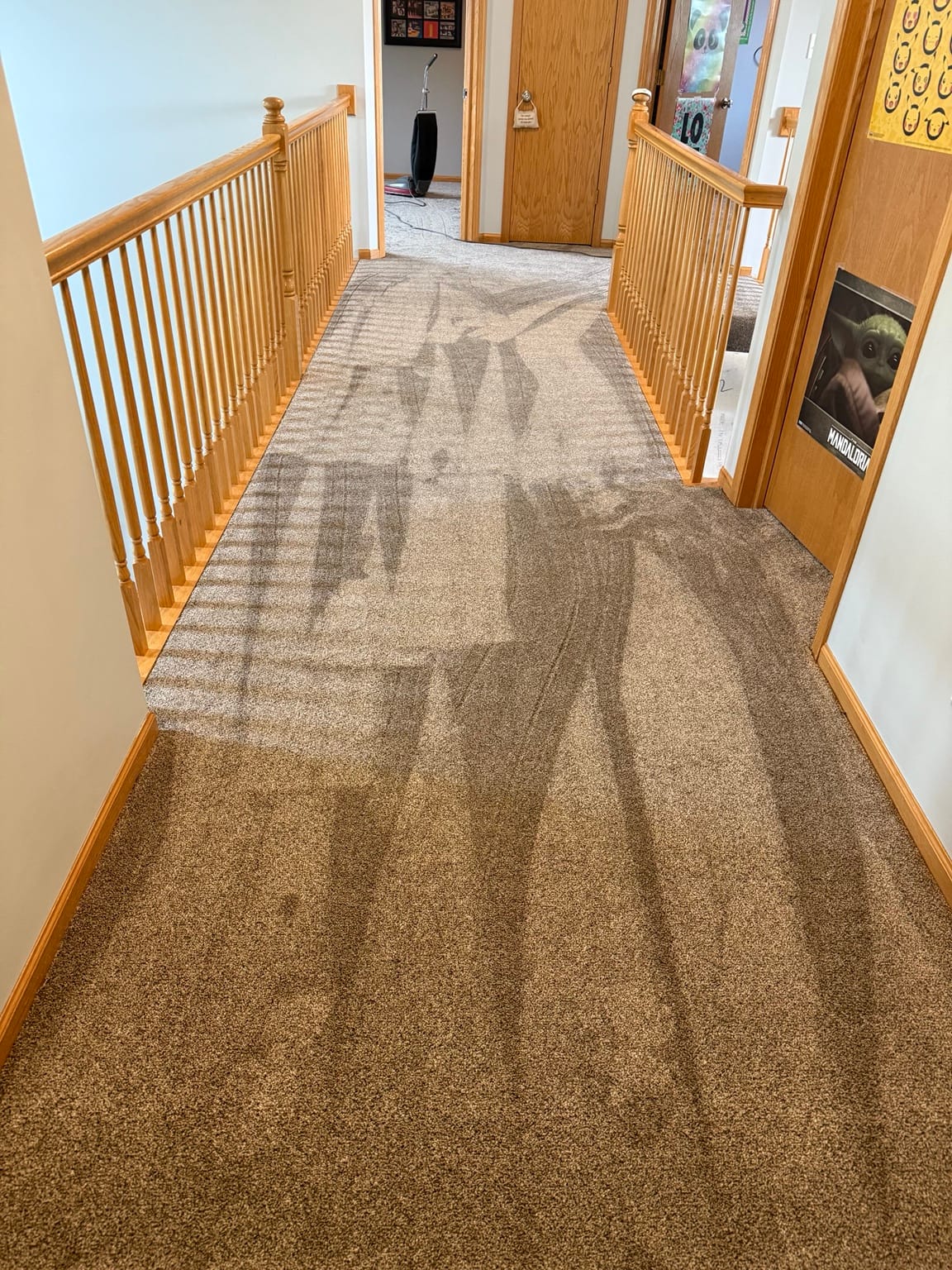 Carpet replacement in a Mokena townhome hallway with soft plush carpet installed by The Floor4U.