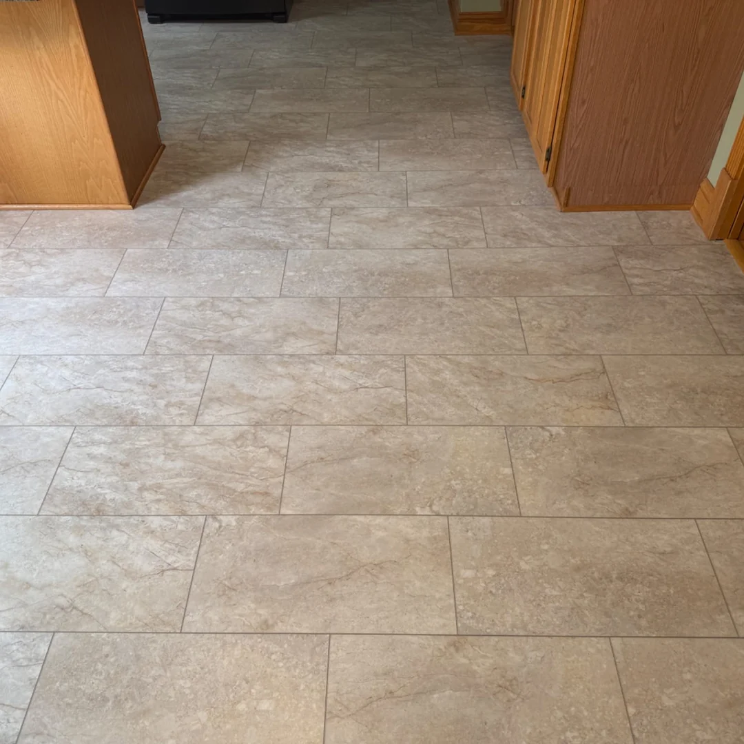 Stone-look porcelain tile kitchen flooring with staggered grout pattern installed by The Floor 4U in New Lenox, IL