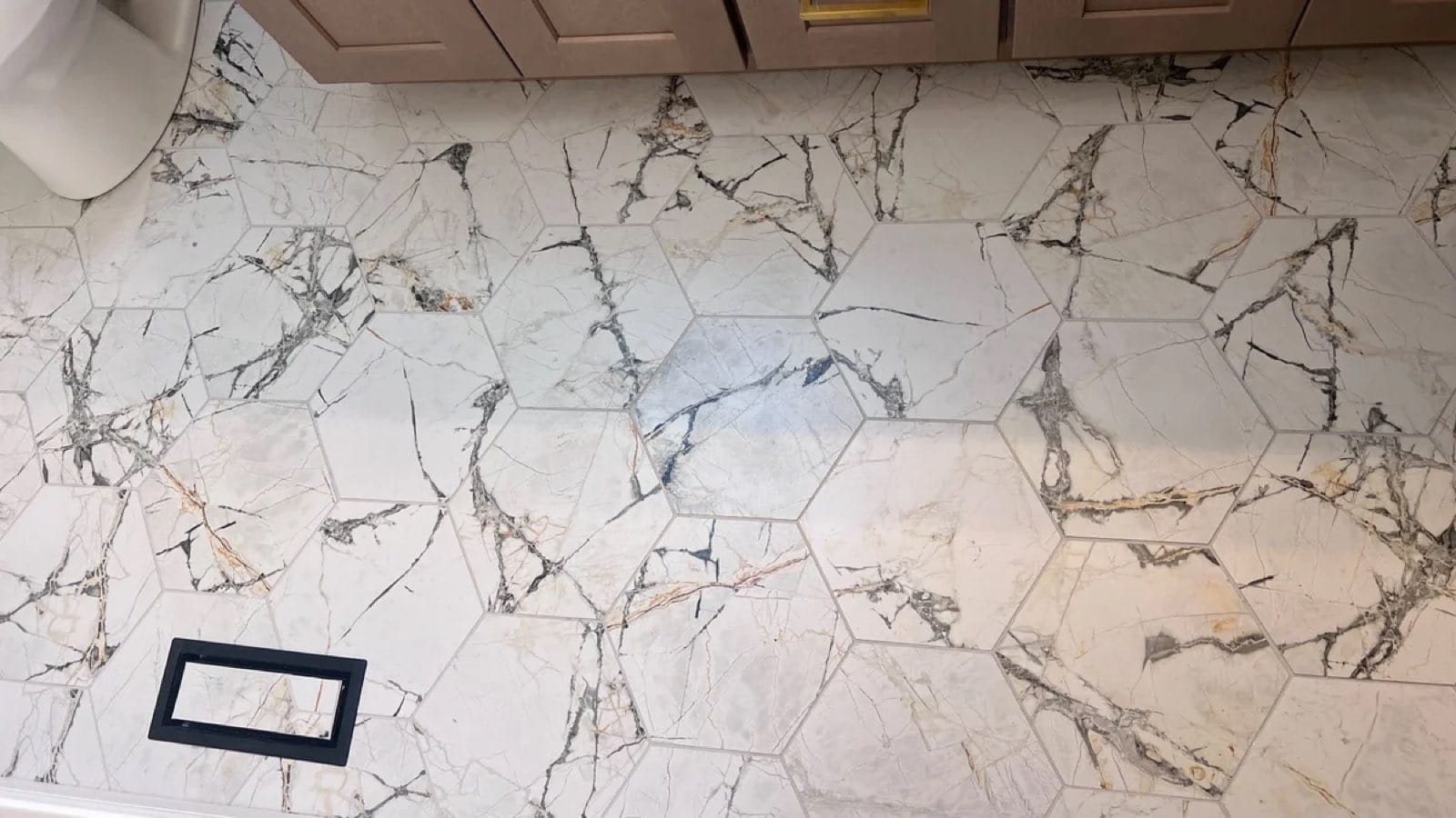 Hexagon marble-look porcelain tile installed in an Orland Hills IL bathroom